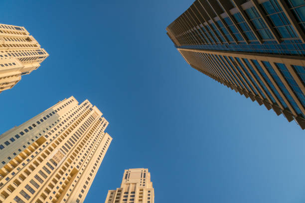 istock Looking up at modern residential skyscrapers 691609762