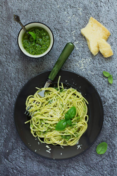 istock Spaghetti with homemade pesto sauce. 691622930