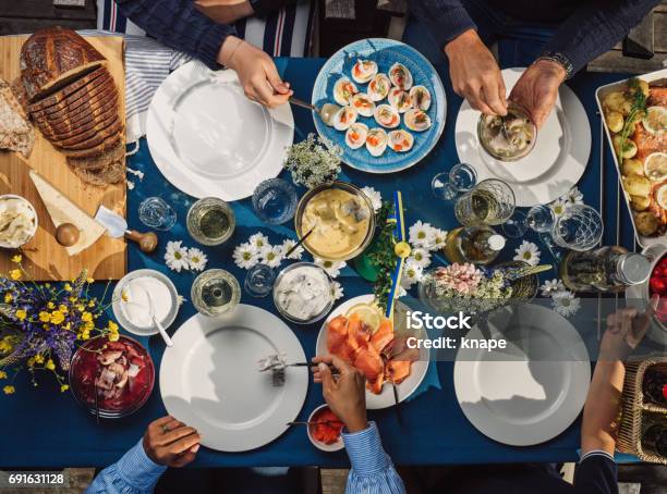 Swedish Summer Midsommar Midsummer Celebration Dinner Party Stock Photo - Download Image Now