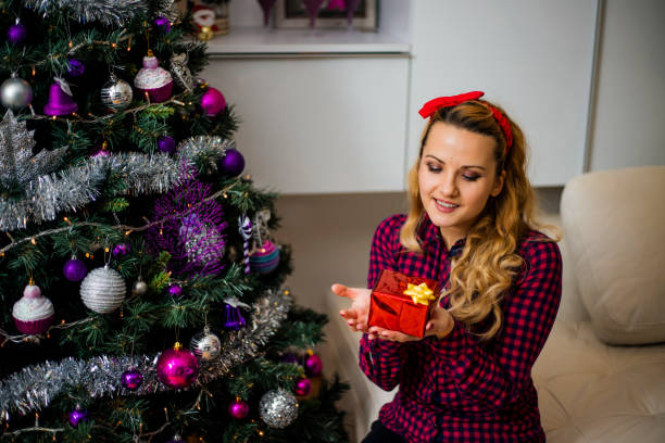 istock Girl with gift 691638680