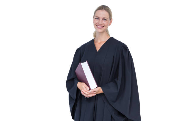 istock Happy pretty lawyer holding law code 691639060