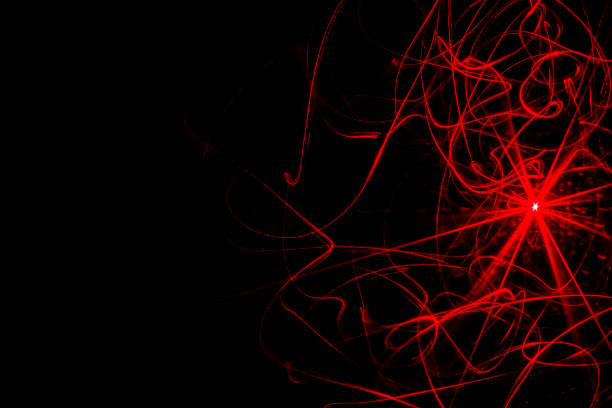 istock abstract picture light laser trail black background 691639184