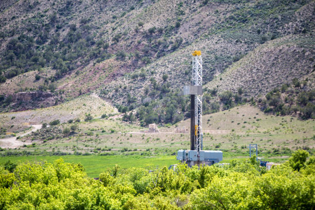 istock Fracking Oil and Gas Drilling Rig Under Dramatic Sky 691649168