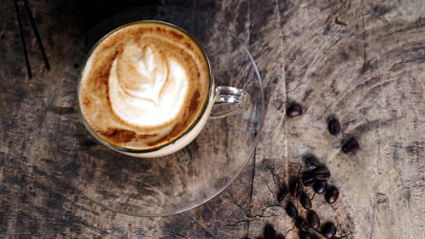 istock Latte art and cappuccino coffee with flowers made from milk 691655874