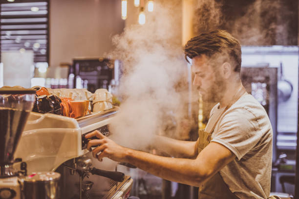 istock Young barista is making a coffee in cafe shop 691658698