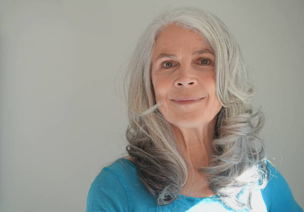 istock Baby boomer with long grey hair 691662354