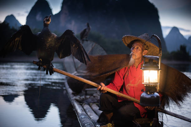 istock Fisherman of Yangshuo 691662632