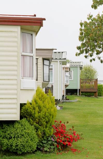 istock Mobile caravans or trailers in holiday park. 691672958