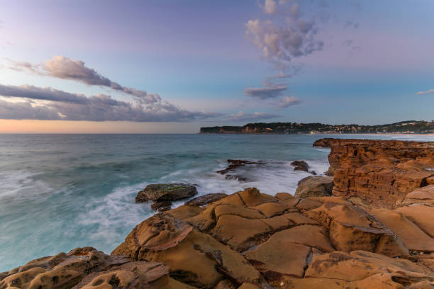 istock Rocky Sunrise Seascape 691673066