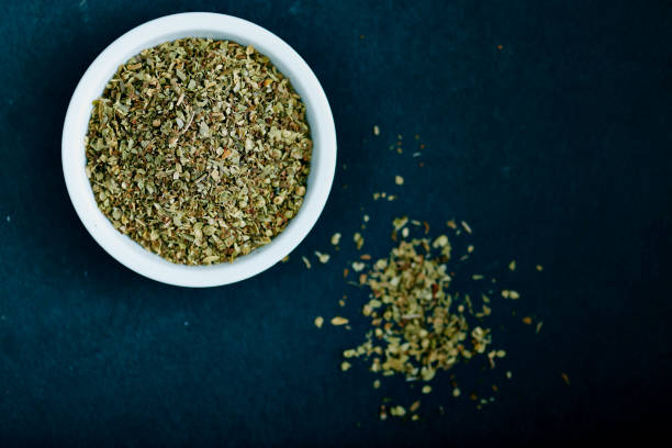 istock Dried oregano herbs in white bowl 691683118