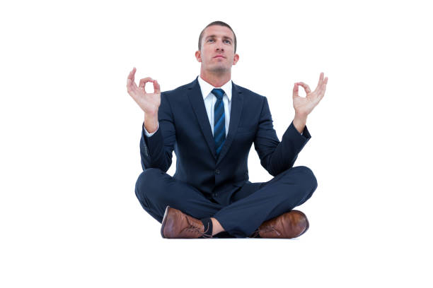 istock Zen businessman in yoga pose 691684104