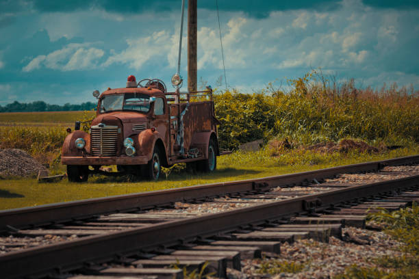 Old truck next to railway line Old truck next to railway line in Clarksdale, blues town mississippi delta stock pictures, royalty-free photos & images