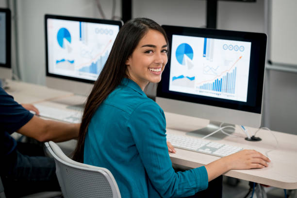 istock Portrait of a female student on a IT class 691693222