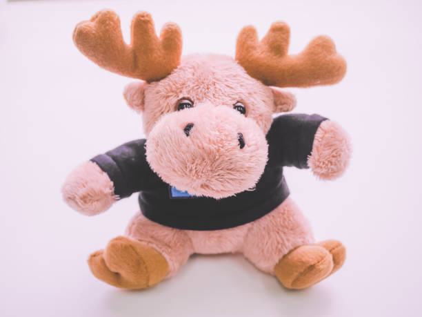 Cute reindeer stuffed toy isolated on white