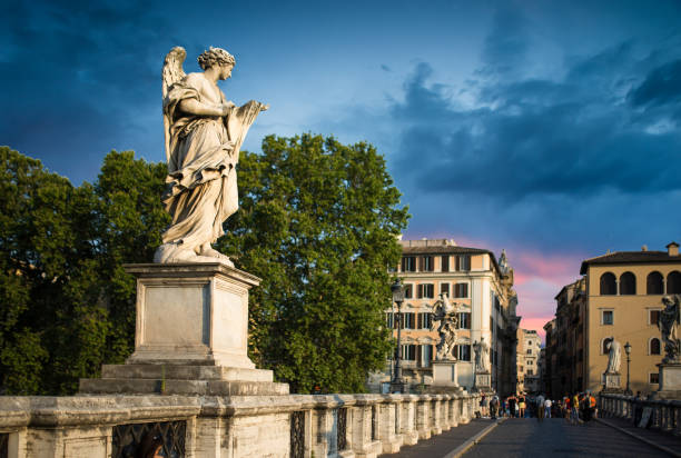 istock Angel statue by Bernini along Sant'Angelo bridge in Rome 691697610