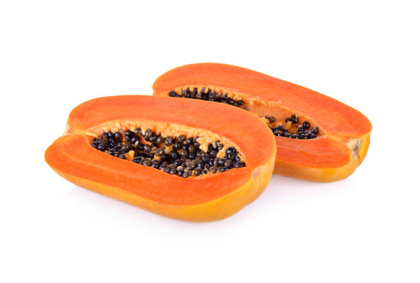 istock half cut ripe papaya with seed on white background 691700602
