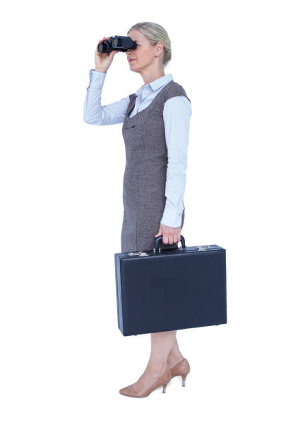 istock Profile of a businesswoman using a binocular 691703022