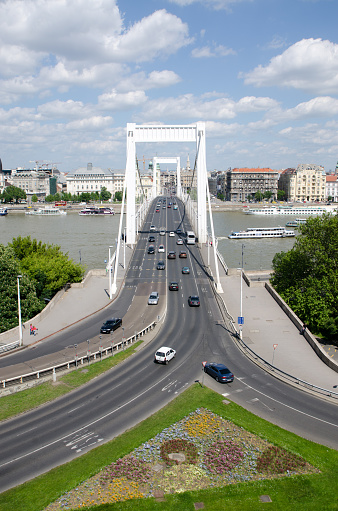 Erzsebet (Elizabeth) suspension bridge in Budapest seen from stairs of Citadel during summer day