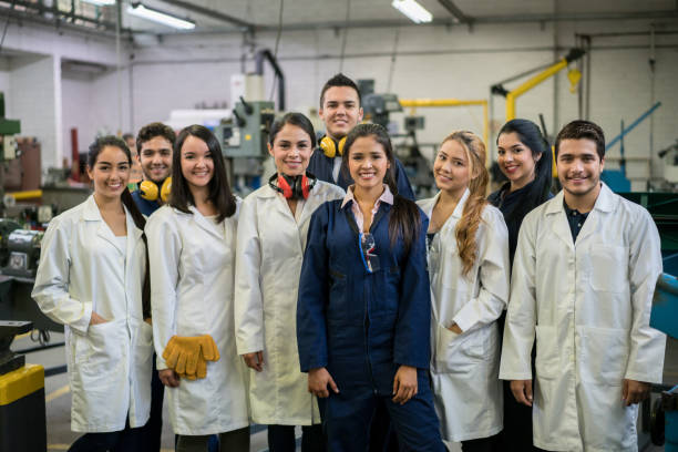 istock Group of engineering students at the university with their teacher 691703492