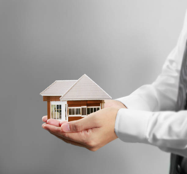 istock Home insurance concept in hand 691709160