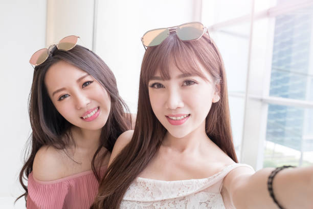 istock women selfie in mall 691709608