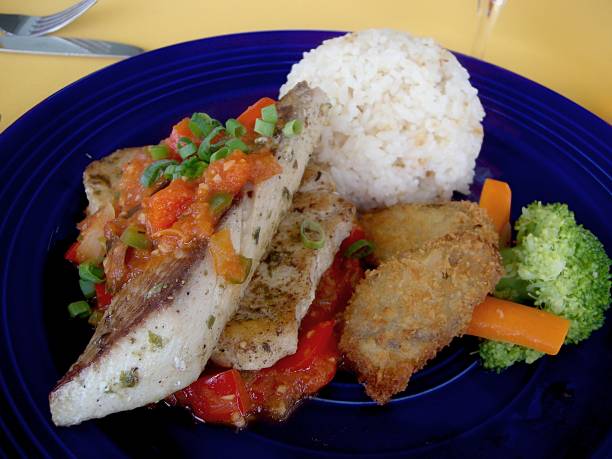istock Grilled fish slices with chicken and vegetables 691710142