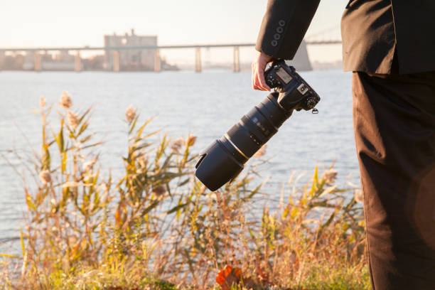 istock A photographer holding camera 691715960