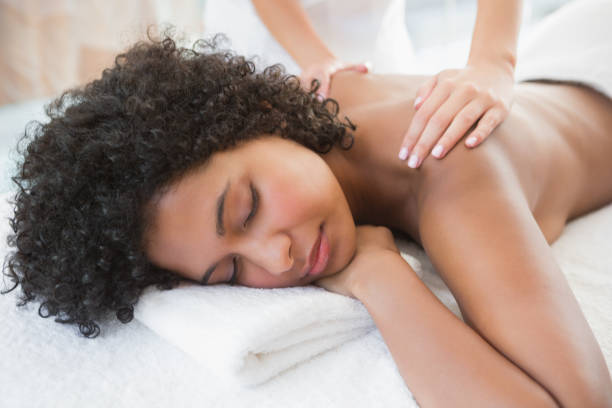 istock Gorgeous woman enjoying a shoulder massage 691716014