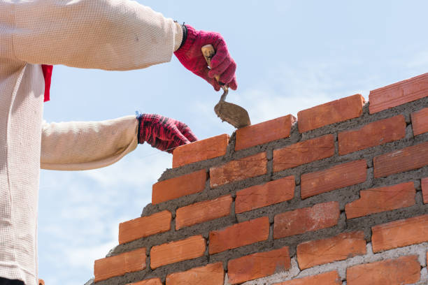 istock Close up of industrial bricklayer installing bricks 691722266