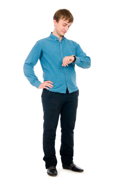 istock Portrait of a young man with a clock. 691722512