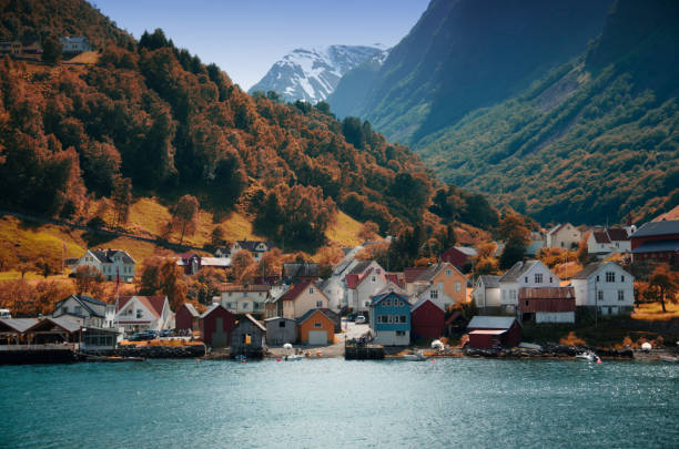 Photo of Beautiful village in Norway. Travel around the fjords in the spring and autumn.