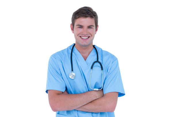 istock Young nurse in blue tunic with arms crossed 691729250