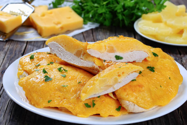 istock Chicken breasts whole and cut in half 691730516