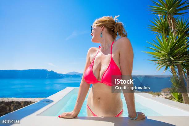 Sexy Woman In Pink Bikini Stock Photo - Download Image Now - Breast, Large, Swimming Pool