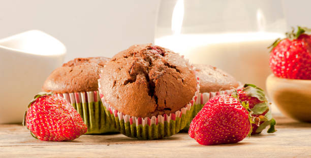 istock Chocolate muffins with strawberries 691744184