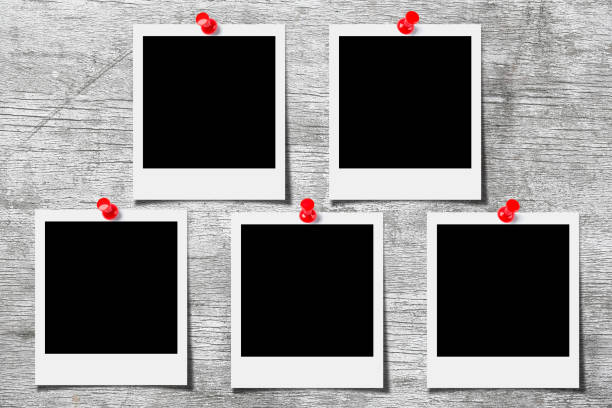 istock Blank photo pinned on the wooden wall 691748256