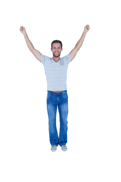istock Happy man raising his arms 691754540