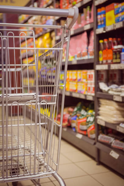 istock Trolley with product on shelf 691758092