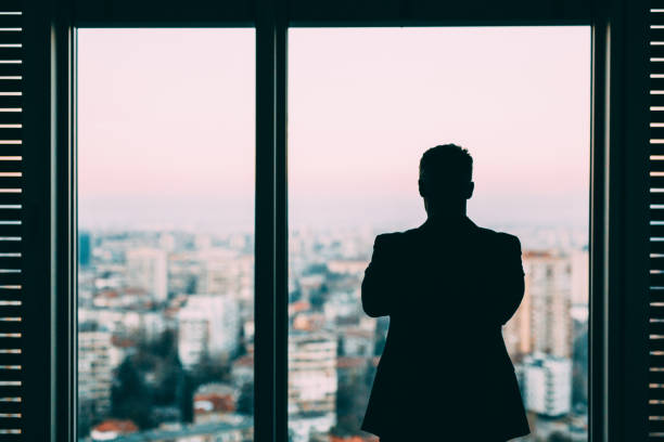 Businessman At The Window