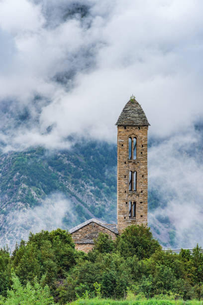 istock Clouds over Sant Miquel Engolasters church,Andorra 691768406