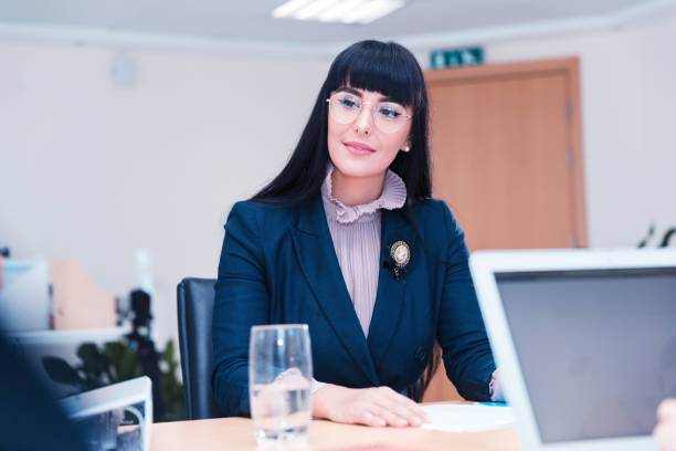 istock Business woman discussing her appraisal with human resources 691768524