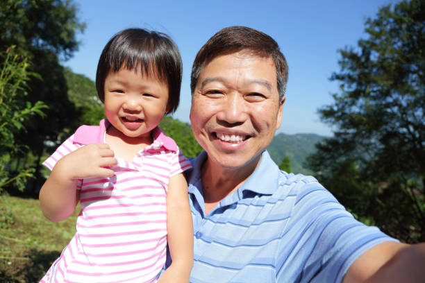 istock Grandfather and granddaughter 691773094