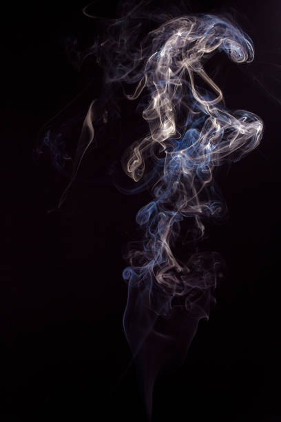 istock Swirl of smoke on black background 691776058