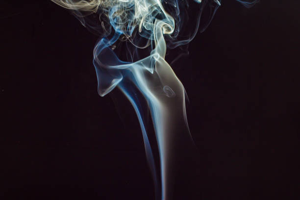 istock Swirl of smoke on black background 691776074