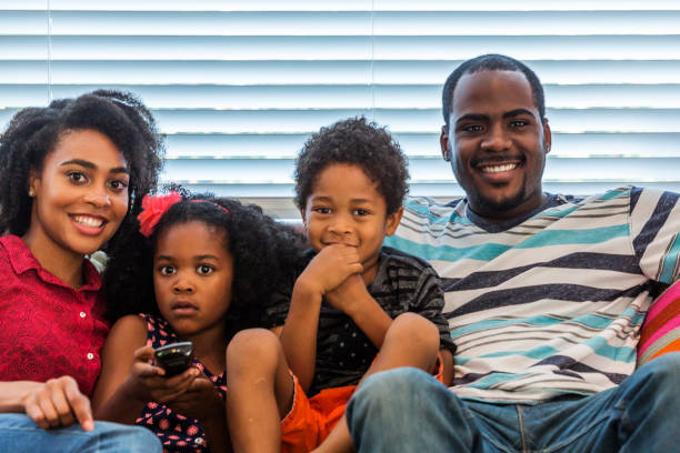 istock Family Moments Watching Television 691778736