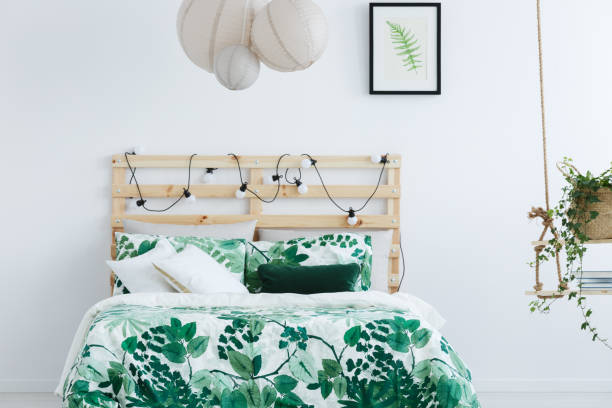 istock White bedroom with wooden bed 691782182