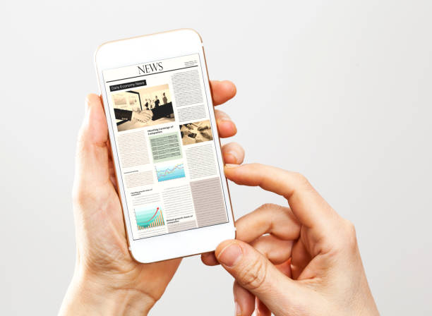 istock Woman hand reading newspaper on mobile phone 691796810