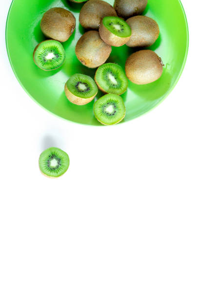 istock exotic fruit design with kiwi on plate on white background top view mock up 691797872