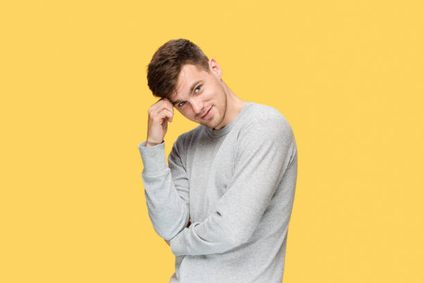 istock The young man smiling and looking at camera 691807404