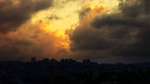 istock Sunset with huge cumuli clouds over the city 691807674